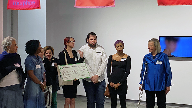 charity accepting their check from the TD Charitable Foundation