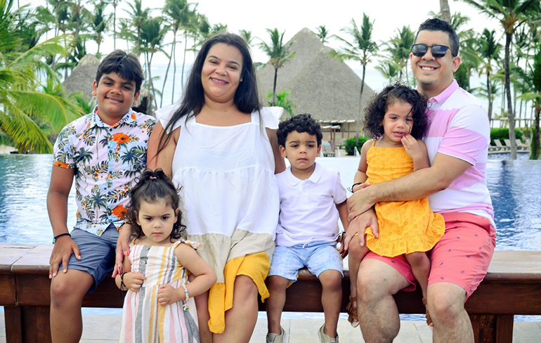 Henry with his wife, 12 year old son, and 3 1/2 year old triplets