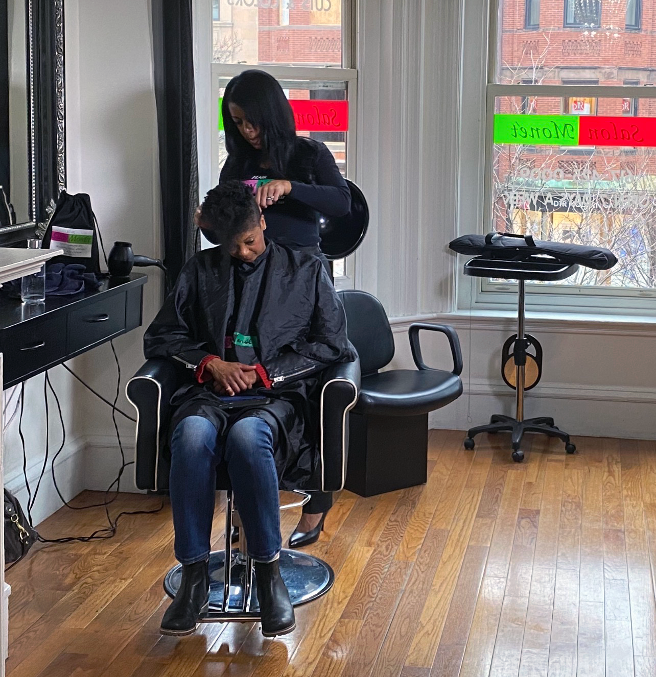 Shellee with a client at her salon