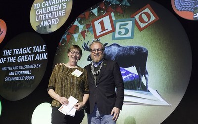 Frank McKenna, Deputy Chair, TD Bank Group, congratulates Canadian children's author Jan Thornhill as the winner of the 2017 TD Canadian Children's Literature Award for her book, The Tragic Tale of the Great Auk. As the winner, Thornhill will take home the top prize of $30,000 - one of the largest of its kind in Canadian children's literature - and title of the most distinguished children's book of the year. (CNW Group/TD Bank Group) Frank McKenna, Deputy Chair, TD Bank Group, congratulates Canadian children's author Jan Thornhill as the winner of the 2017 TD Canadian Children's Literature Award for her book, The Tragic Tale of the Great Auk. As the winner, Thornhill will take home the top prize of $30,000 - one of the largest of its kind in Canadian children's literature - and title of the most distinguished children's book of the year. (CNW Group/TD Bank Group)