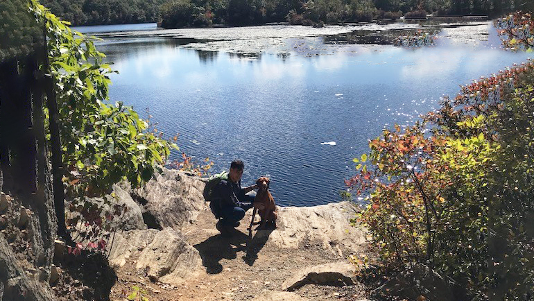 Anthony Sasso on a hike with his dog