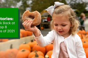 girl holding a donut