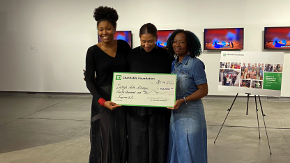 charity accepting their check from the TD Charitable Foundation