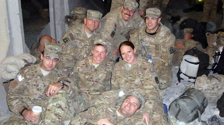 Anna pictured with other people she was in the military with