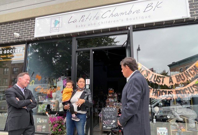 Leaders from TD and the Brooklyn Chamber of Commerce speak with Berta Hernendez-Villa, owner La Petit Chambre restaurant