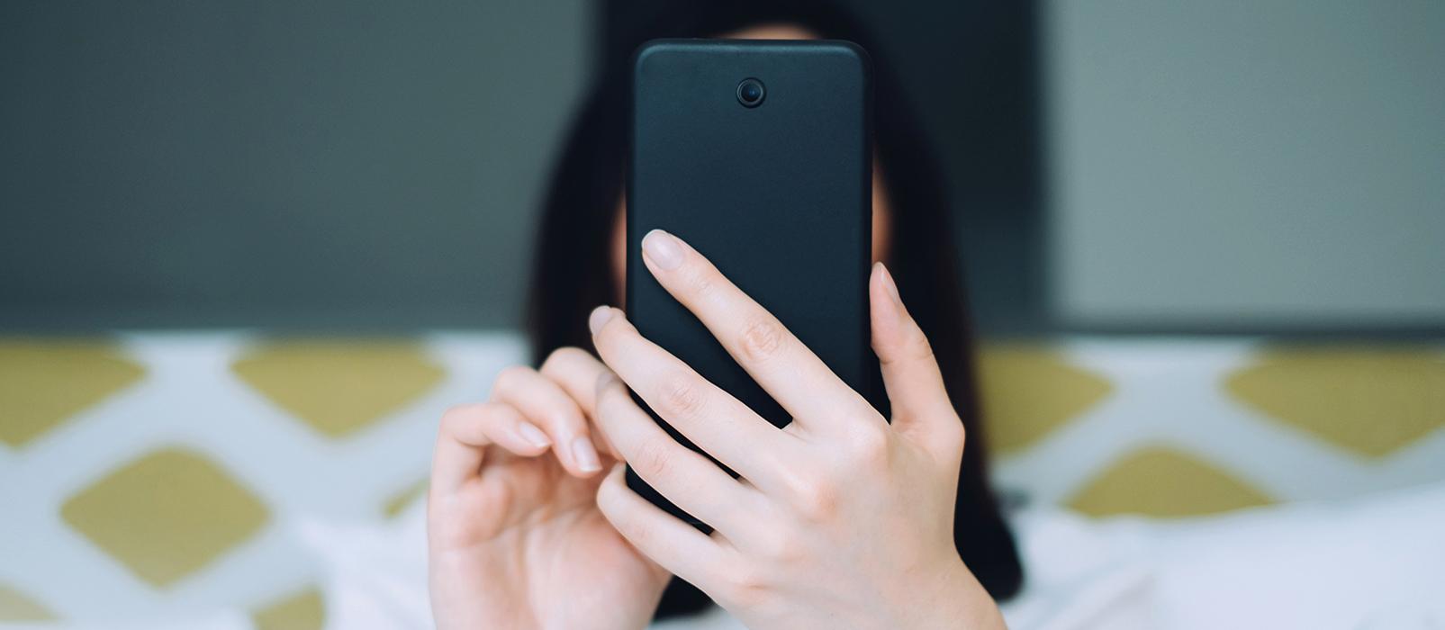 Person holding a cell phone