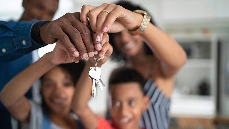 Family with new house keys
