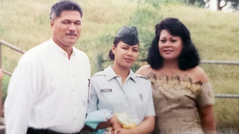 Natalie with her parents