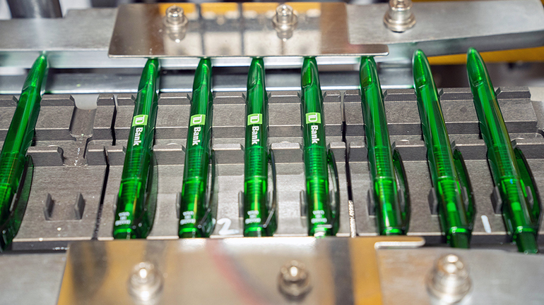 TD Bank pens being made in the assembly line
