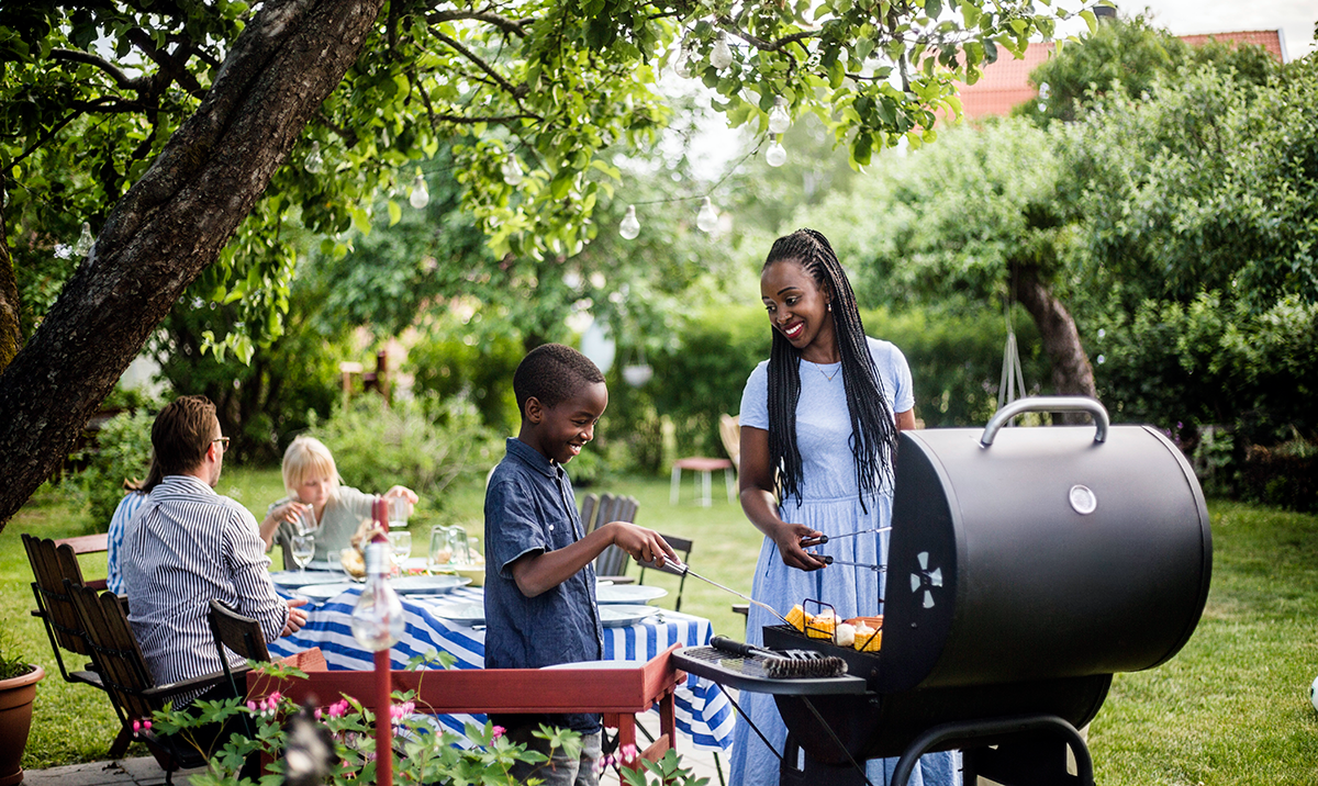 Family having a cookout outside