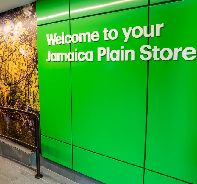 Welcome sign at Jamaica Plain Store