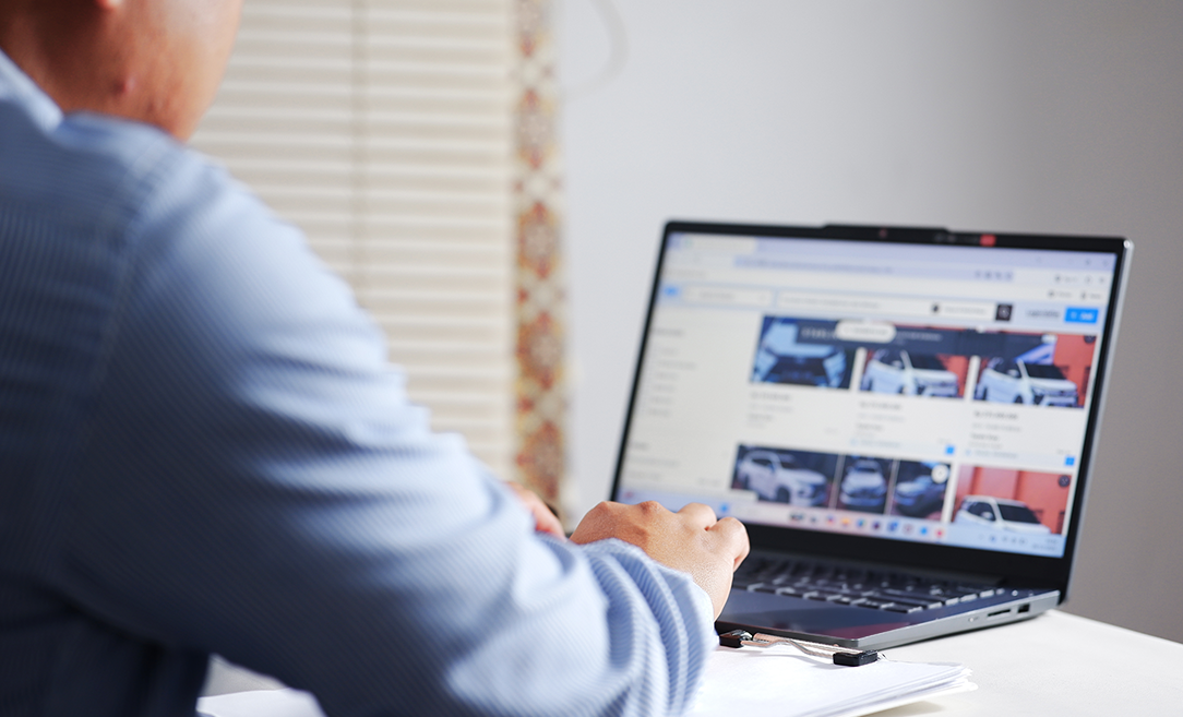 Man shopping for a car online