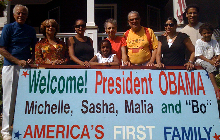 When the Obamas first visited the island, Ted's family put up a sign outside their home to welcome them