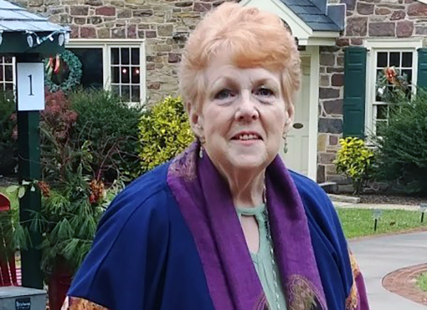 An older woman with short, blonde hair (Kate Kleinert)