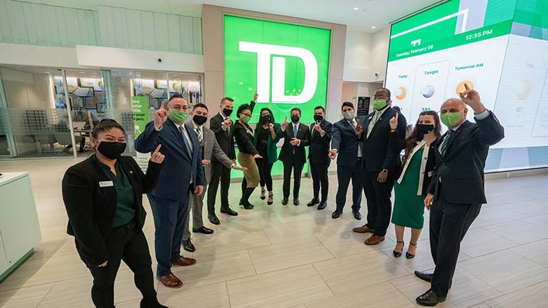Leo in a group photo with TD employees at One Vanderbilt