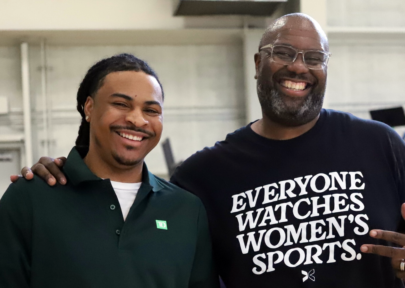 Mitchell Rice (man with long, dark hair and a mustache) and Mitchell Hercule (bald man with dark beard and glasses)