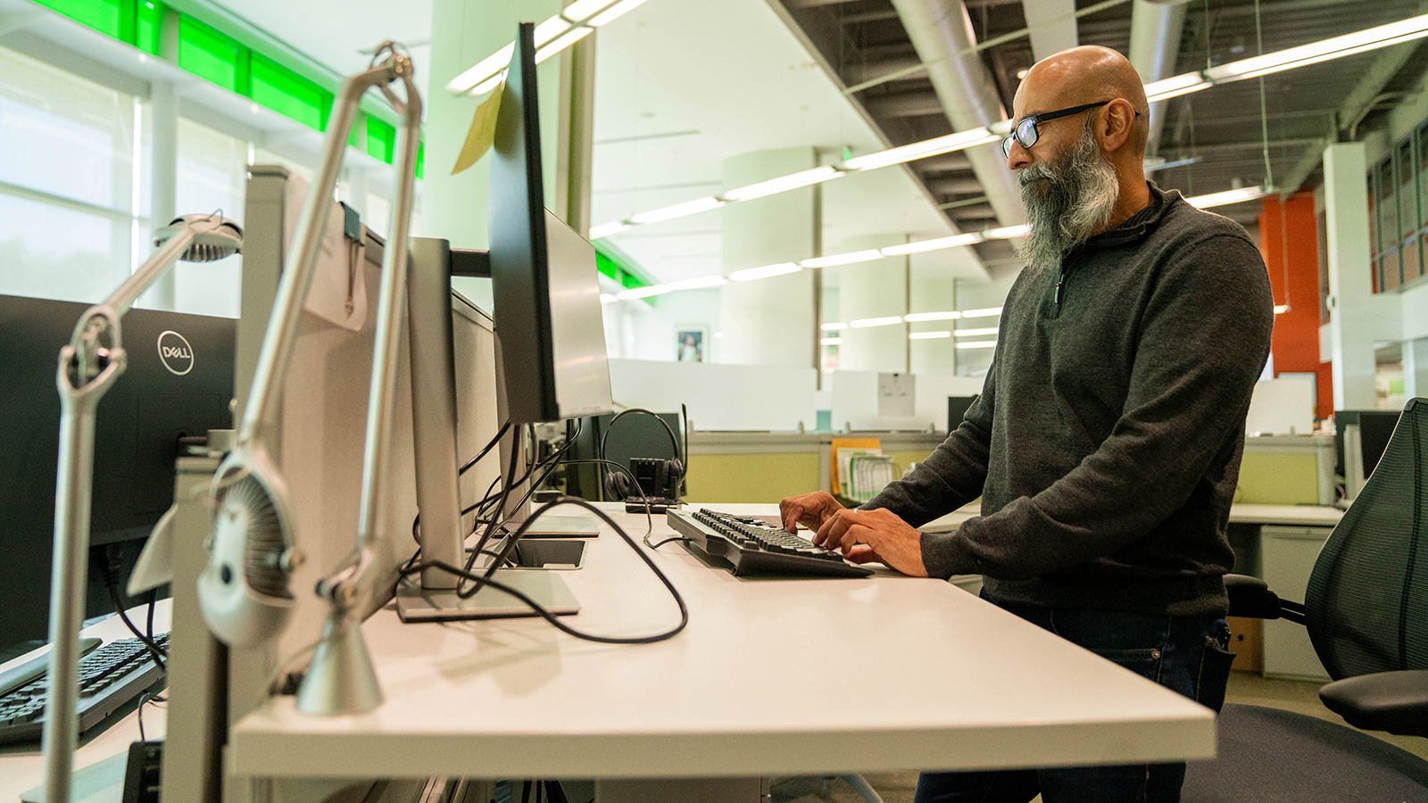 Ravi at his desk in the office