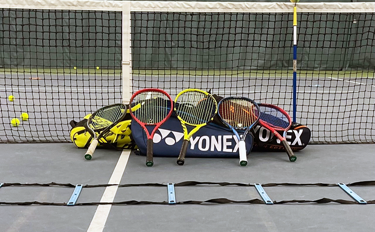 Tennis equipment on a tennis court