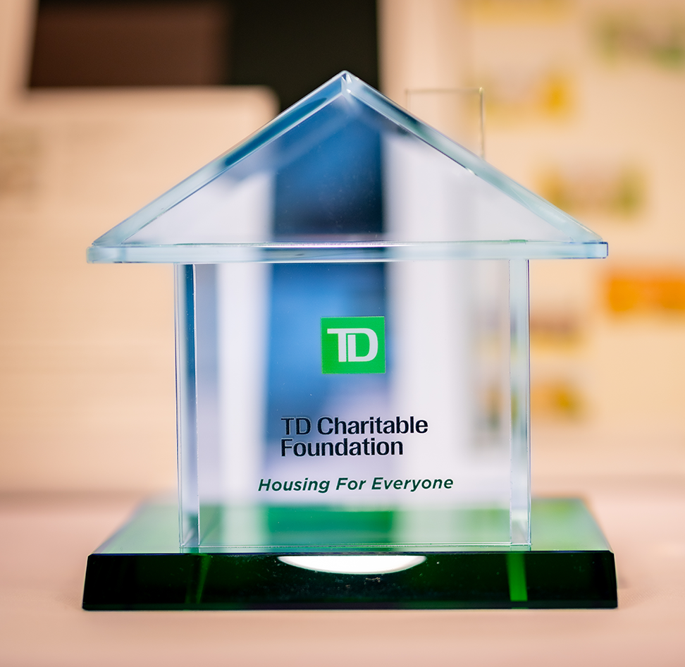 Glass statue of house with