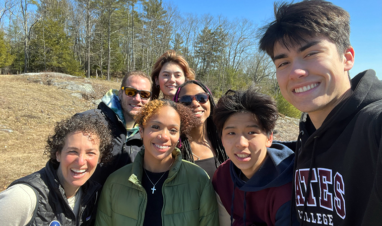 Students taking a selfie outside