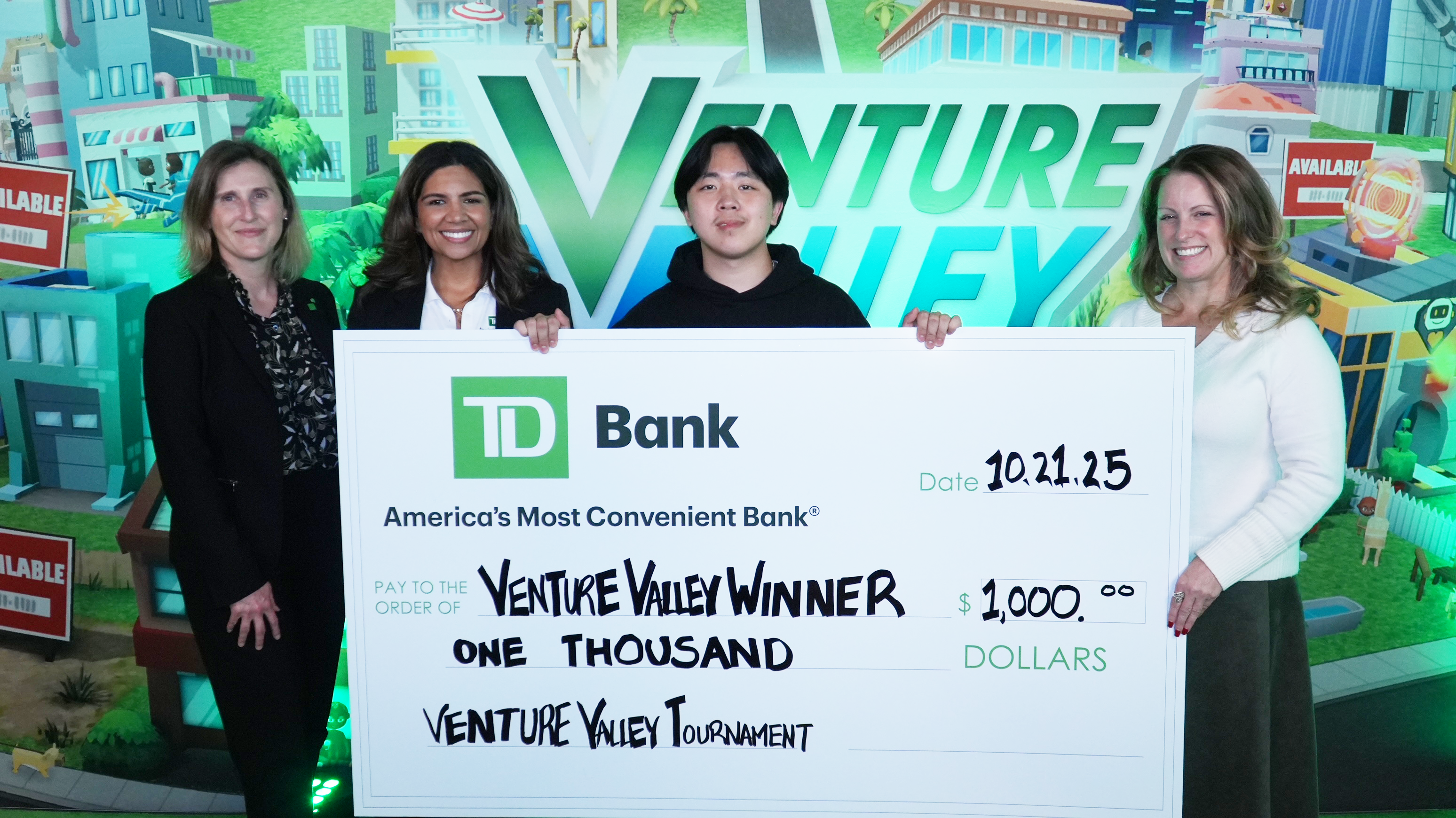 Winner of the competition with a check