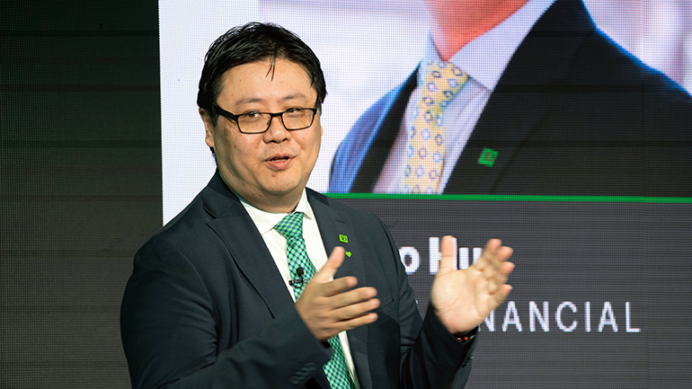 Xihao speaking at a TD event